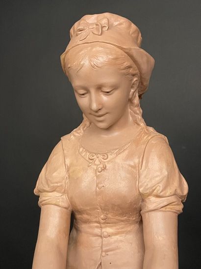 Jeune fille et enfant.
Grande épreuve en...