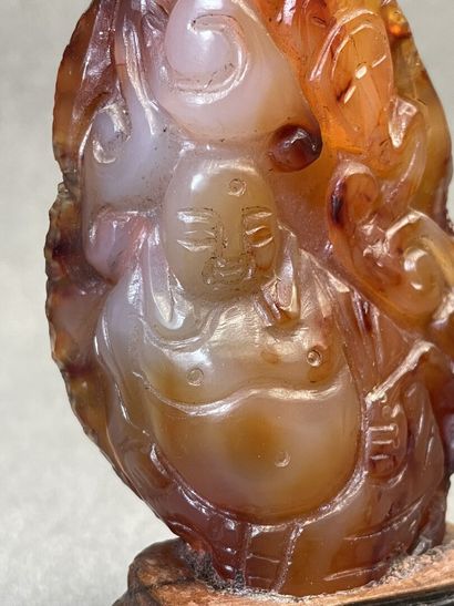 Bouddha sculpté sur une pierre.
H. :11 m...