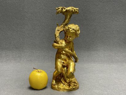 Elément de candelabre en bronze doré. 
H....