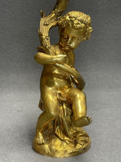 Elément de candelabre en bronze doré. 
H....