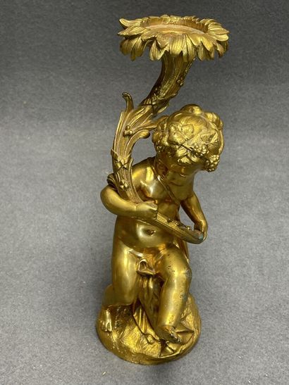 Elément de candelabre en bronze doré. 
H....