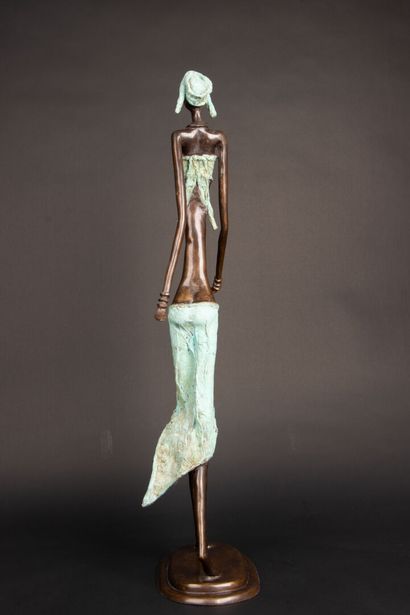 Grande sculpture en bronze polychrome:
Femme...