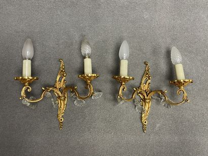 Paire d'appliques à deux lumières en bronze...