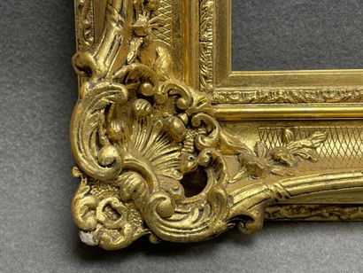 Cadre en bois et stuc doré. 
Dim. intérieur:...
