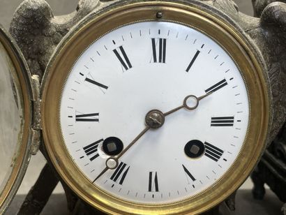 Pendule de cheminée régule et marbre noir....