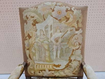Fauteuil de style Régence, garni de tapisserie...