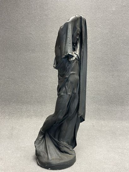 Homme drapé. 
Sulpture en platre gainé de...