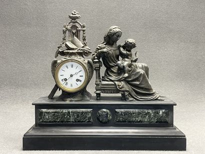 Pendule de cheminée régule et marbre noir....