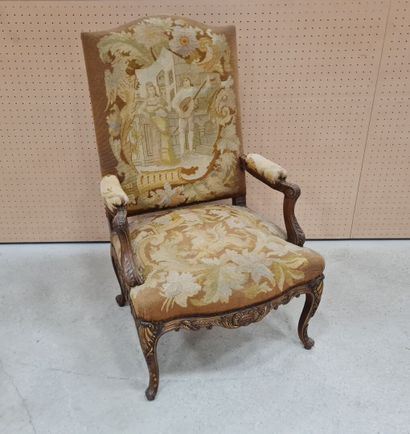 Fauteuil de style Régence, garni de tapisserie...