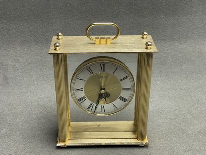 SEIKO
Pendulette de table en métal doré....