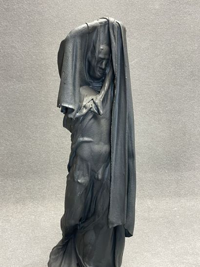 Homme drapé. 
Sulpture en platre gainé de...