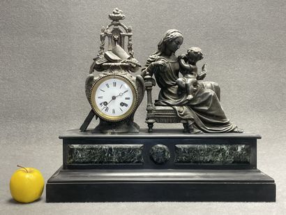 Pendule de cheminée régule et marbre noir....