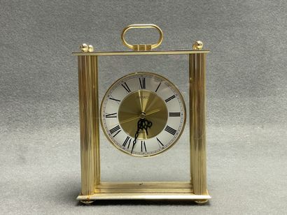 SEIKO
Pendulette de table en métal doré....