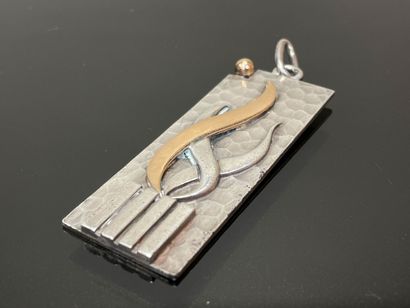 JEAN DESPRÉS (1889-1980) 
Silver plate pendant,...