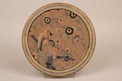 Louis LOURIOUX (1874-1930)
Plat en grès à...