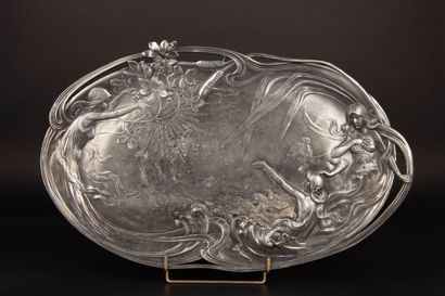 Large pewter tray decorated with elegant...