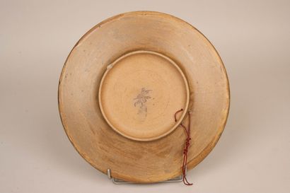 Louis LOURIOUX (1874-1930)
Plat en grès à...