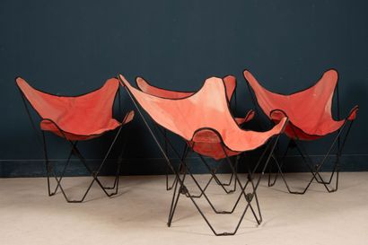 Suite de quatre fauteuils pliants type Butterfly.
Années...