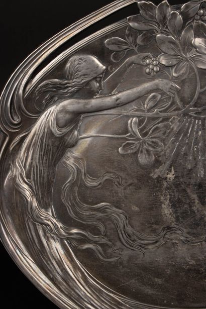 Large pewter tray decorated with elegant...