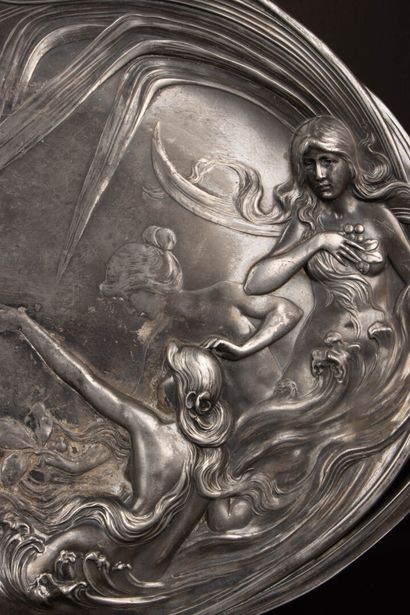 Large pewter tray decorated with elegant...