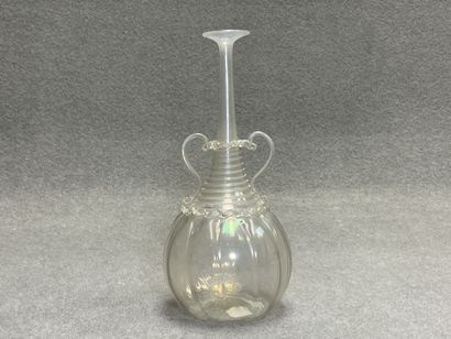 Bouteille Venise fin XIXe en verre irisé
H.21...