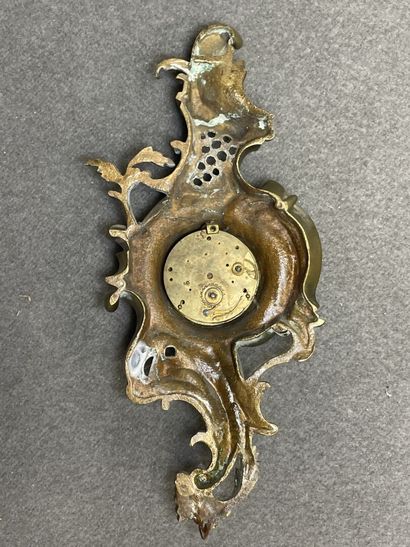 Petit cartel d'applique en bronze.
Style...