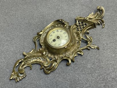 Petit cartel d'applique en bronze.
Style...