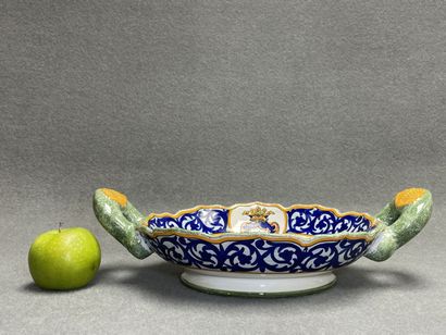 Henriot Quimper.
Melonnière en faience à...