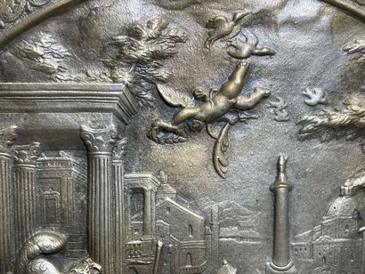 Bas-relief en bronze à décor de scène antique....