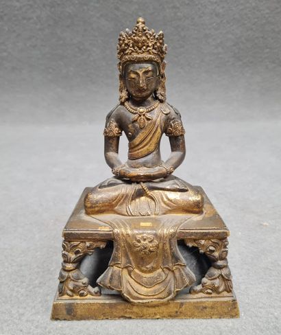 Bouddha en bronze patiné et doré.
TIBET XX°
18...