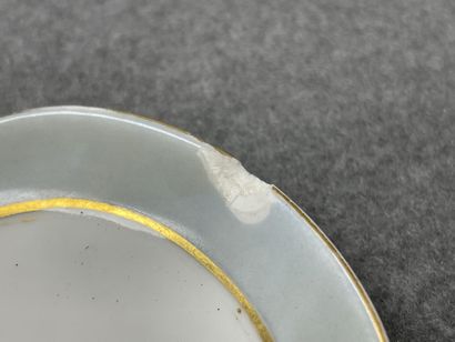 Partie de service de table en porcelaine...