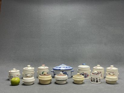 Ensemble de 13 terrines en faience, principalement...