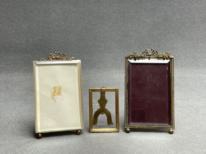 Trois cadres photo en bronze et verre.
20...