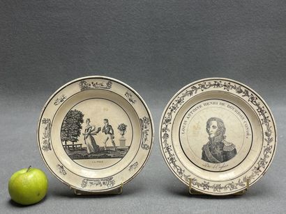 Deux assiettes en faïence de Choisy le roi,...