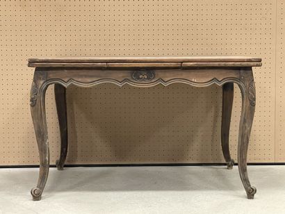 Table en chêne de style Louis XV
Allonges...