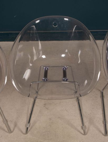 Quatre fauteuil plexiglas et métal chromé....