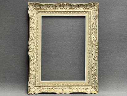 Cadre en bois et stuc.
Dim. intérieur: 55...