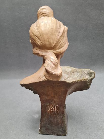 Buste de femme en plâtre patine.
Vers 1900
H:...