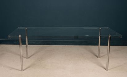 Glass table, chrome-plated metal legs. 
74...