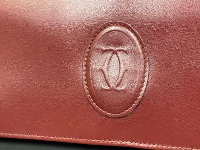 CARTIER Hand clutch bag in burgundy leather
18...