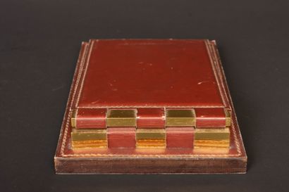 HERMÈS Paris. 
Notepad in burgundy box and...