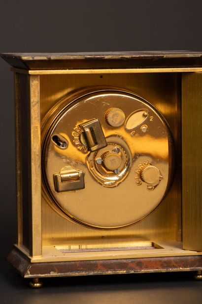 HERMÈS Paris. 
Travel clock in gilt metal...