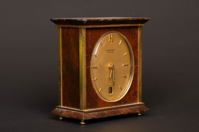 HERMÈS Paris. 
Travel clock in gilt metal...
