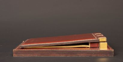 HERMÈS Paris. 
Notepad in burgundy box and...