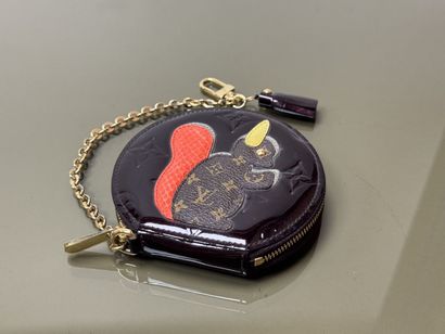 LOUIS VUITTON
Chromed brown round purse with...