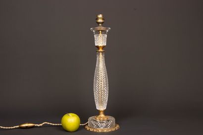 Pied de lampe en cristal et bronze doré....