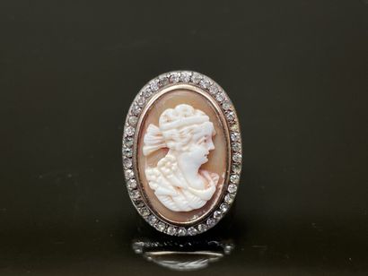 Gold and silver ring, cameo, surrounded by...