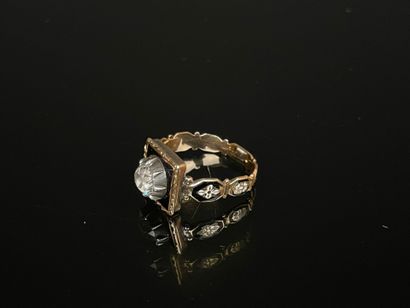 Black enameled gold ring set with a brilliant...
