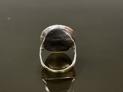 Gold and silver ring, cameo, surrounded by...