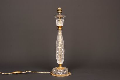 Pied de lampe en cristal et bronze doré....